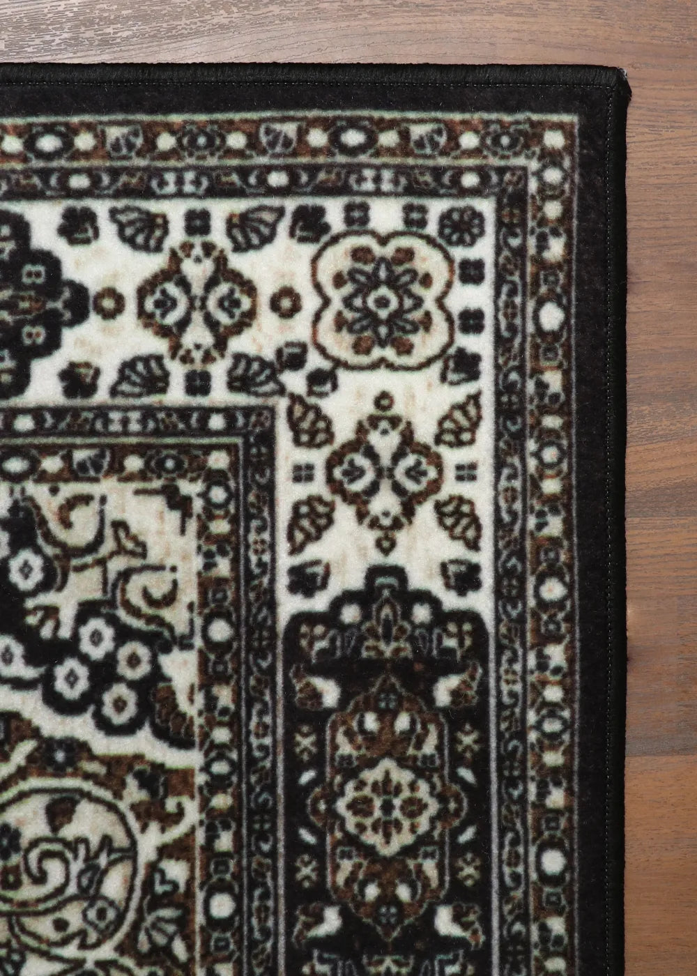 Elegant Black and Cream Non-Woven Medallion Rug