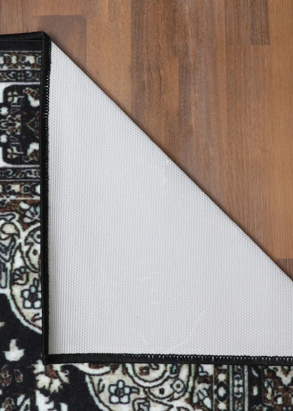 Elegant Black and Cream Non-Woven Medallion Rug